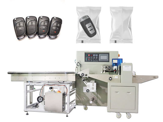 समग्र फिल्म इलेक्ट्रॉनिक पैकेजिंग रैपिंग मशीन 220v 3KW